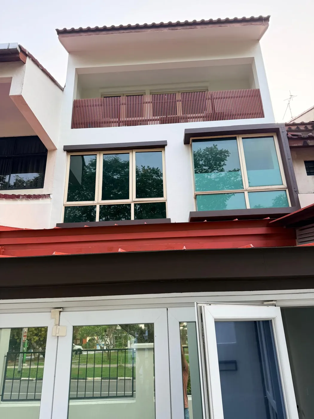 Upper floors and windows of the renovated Lentor Terrace landed house