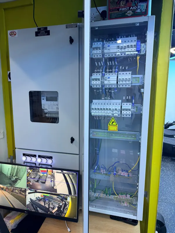 Electrical distribution cabinet and wall-mounted control panel at Blk 233 Lorong 8 Toa Payoh