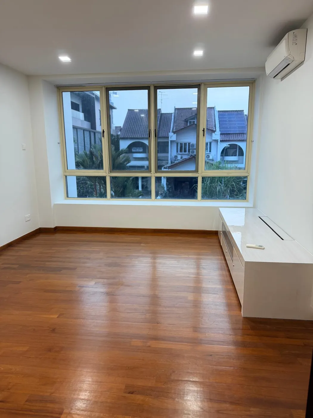 Bedroom with timber flooring and full-width windows, Lentor Terrace landed house