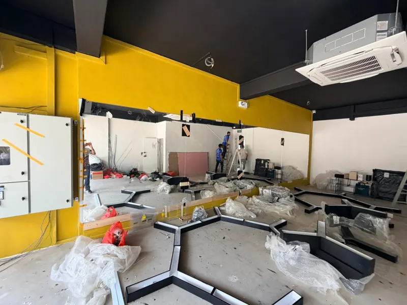 Electrical works in the shophouse interior with wall mirrors and ceiling air-conditioning at Blk 233 Lorong 8 Toa Payoh